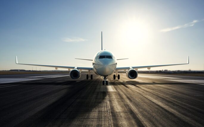Airplane,Parked,On,The,Airport,Runway,,3d,Rendering